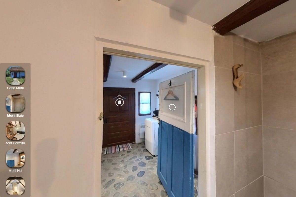 Tur virtual 360° pentru pensiuni și hoteluri 2 Trecerea dintre încăperi în turul virtual 360° Casa Morii — oaspetele „se plimbă" prin casă | GetVizual