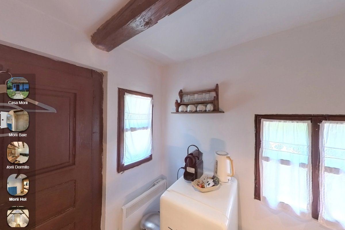 Cum se face un tur virtual 360°: procesul pas cu pas 1 Interior luminos capturat în turul virtual 360° Casa Morii, cu punctele de navigare vizibile | GetVizual